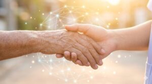 テクノロジーと人の手が重なり合い、介護の未来を創るイメージ